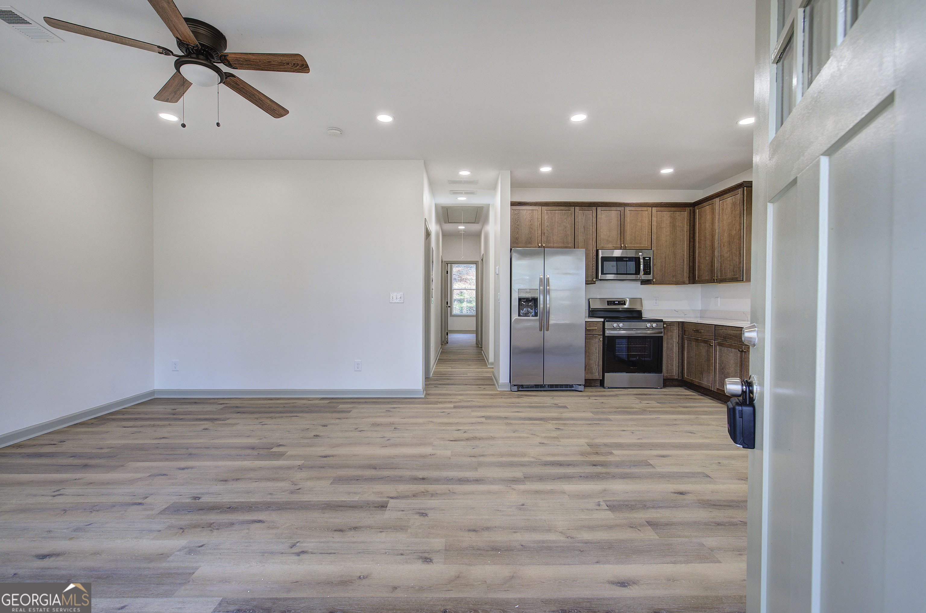 117 East Boundary Street Southeast Rome, GA 30161 - Photo 4 of 36 a view of kitchen with refrigerator and window