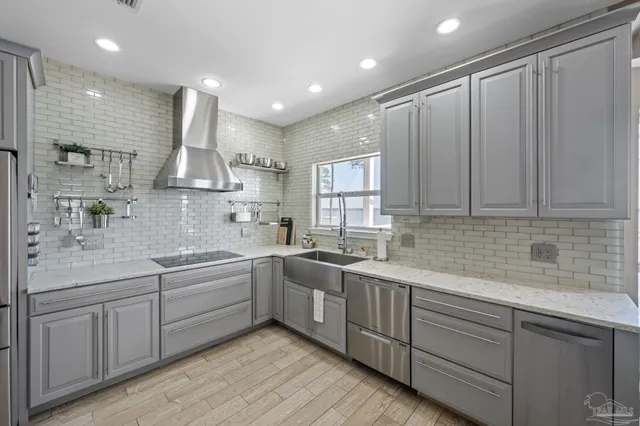 a kitchen with sink cabinets and window