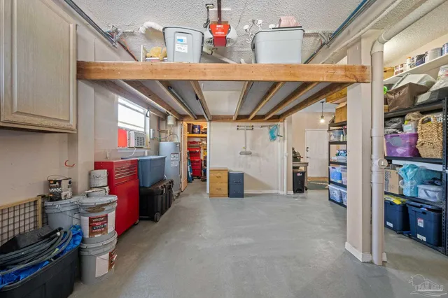 a view of a patio with chairs and a table