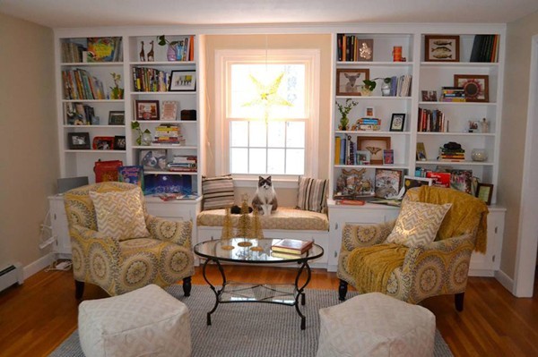 208 Worcester Road Princeton, MA 01541 - Photo 5 of 15 a living room with furniture and a book shelf