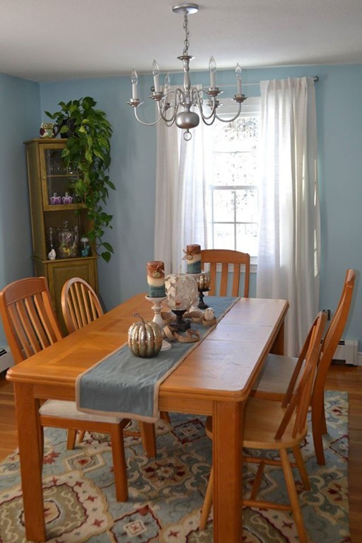 208 Worcester Road Princeton, MA 01541 - Photo 6 of 15 a view of a dining room with furniture window and outside view