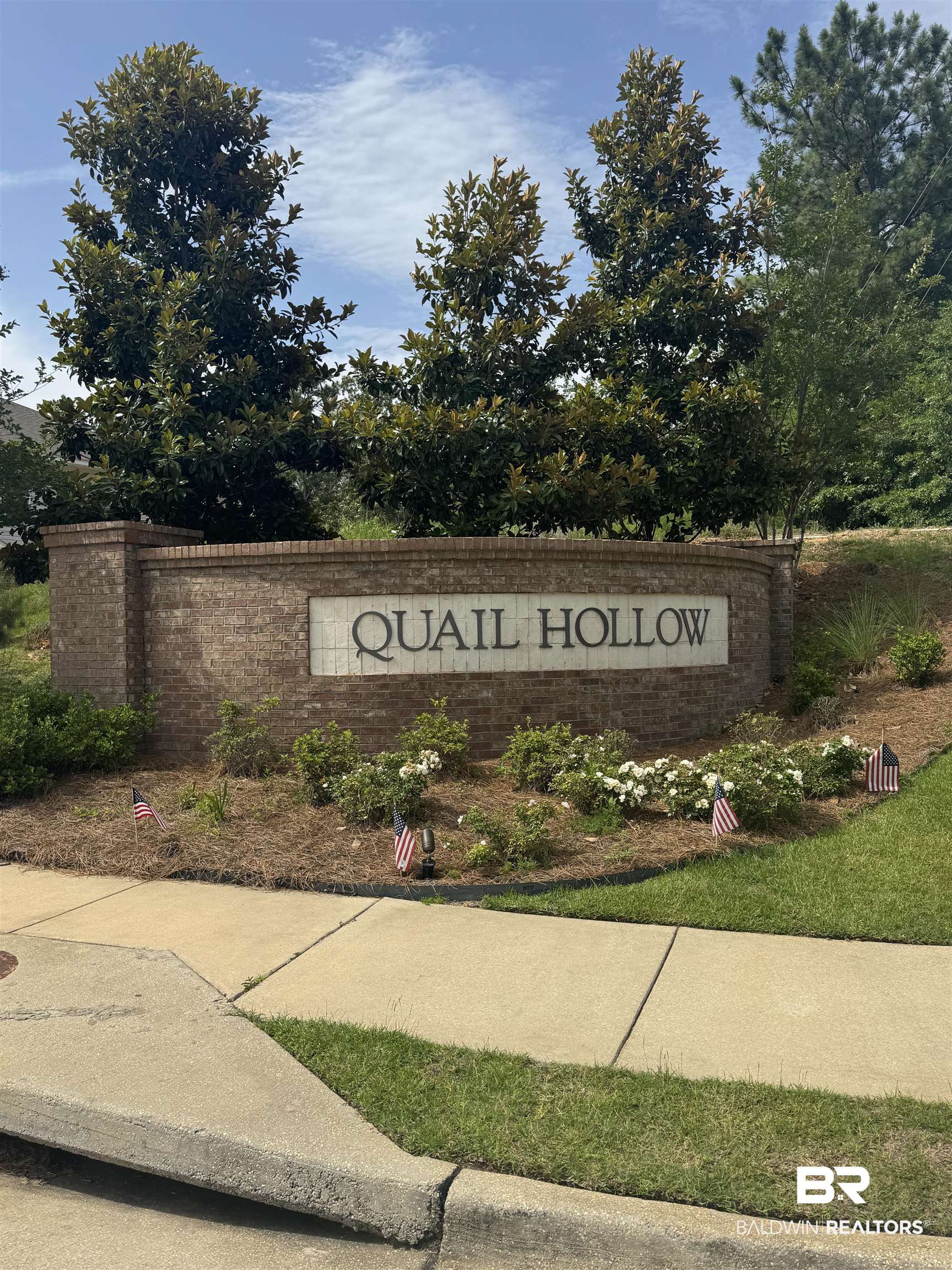 6811 Spaniel Drive, Unit C Daphne, AL 36527 - Photo 30 of 33 View of community / neighborhood sign