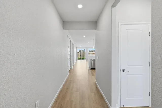 a bathroom with double sink and a mirror