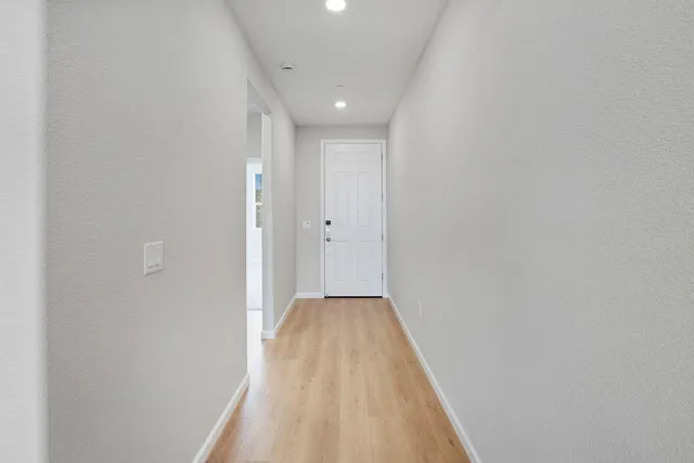 a bathroom with a double vanity sink and mirror