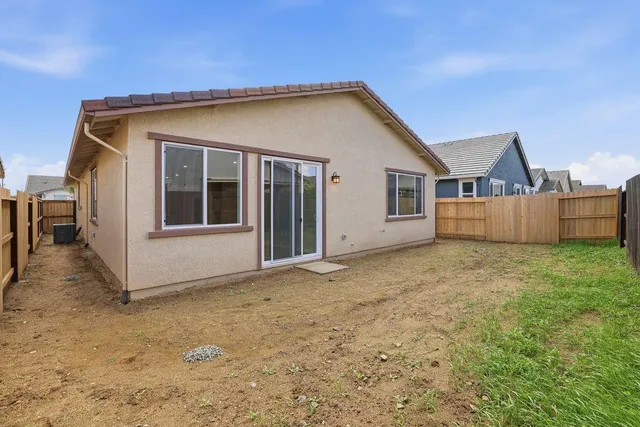 a view of a backyard with a garden