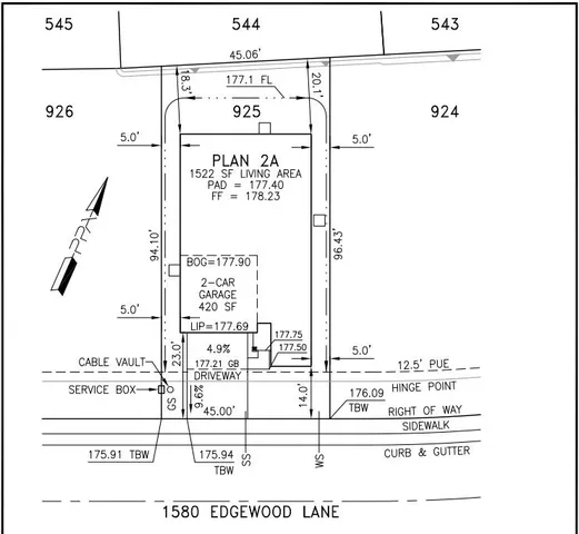 aerial view of a brick building with glass windows