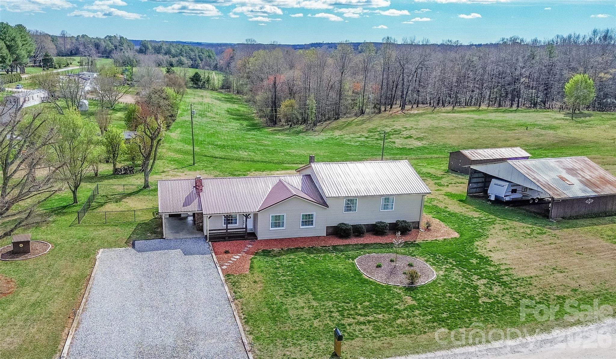 455 Mitch Road Union Grove, NC 28689 - Photo 1 of 44 an aerial view of a house with garden