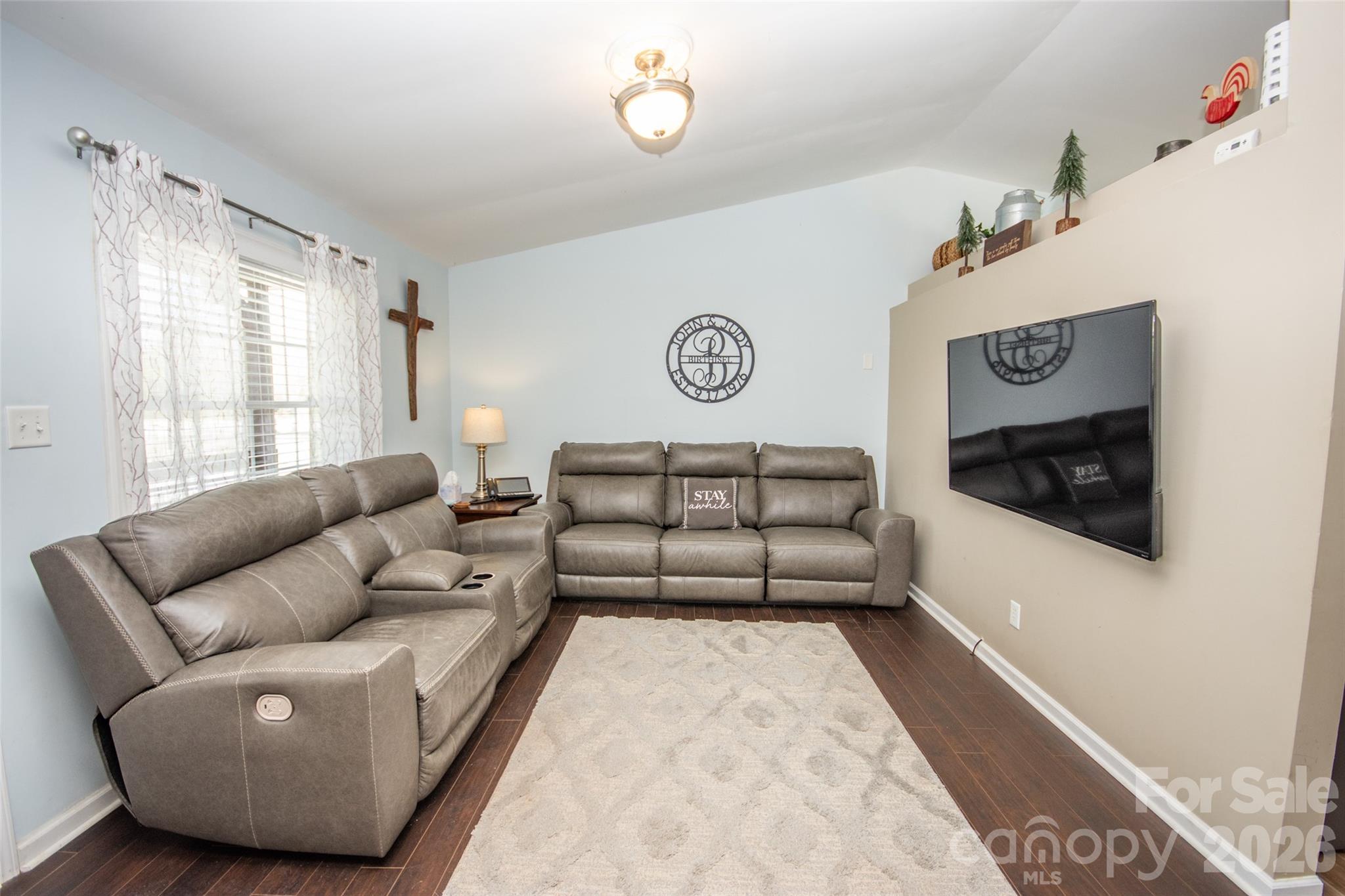 455 Mitch Road Union Grove, NC 28689 - Photo 12 of 44 a living room with furniture and a window