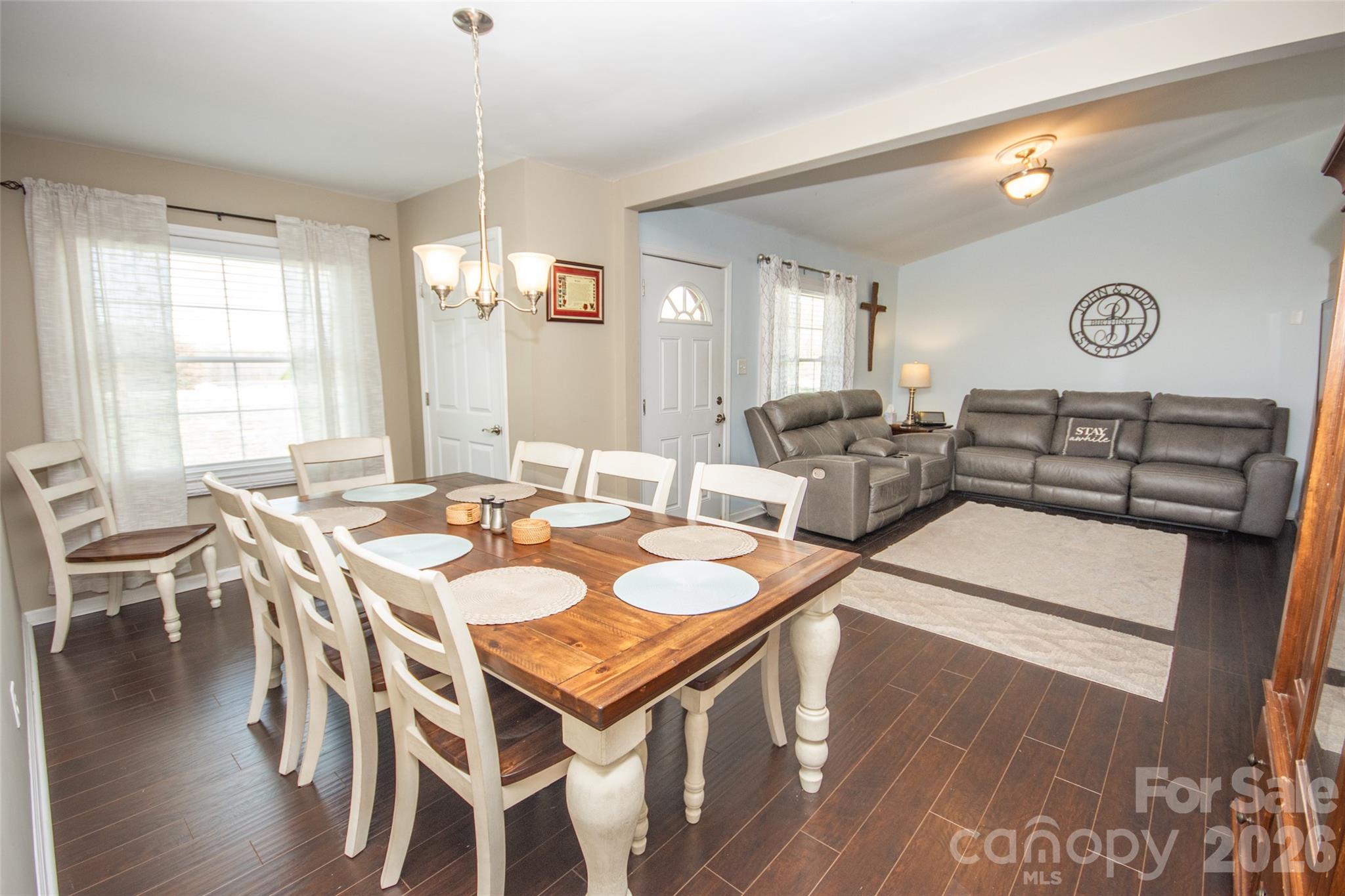 455 Mitch Road Union Grove, NC 28689 - Photo 15 of 44 a view of a dining room with furniture window and wooden floor