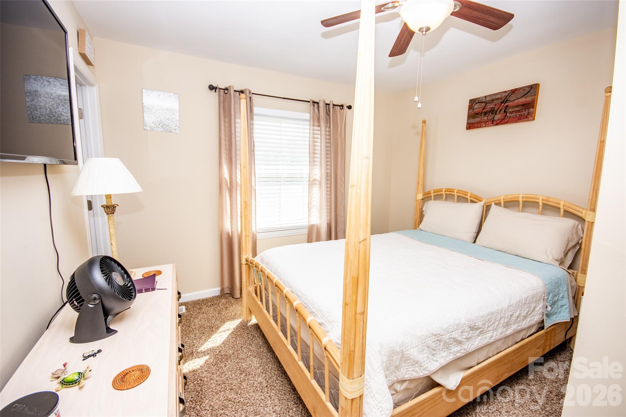 455 Mitch Road Union Grove, NC 28689 - Photo 22 of 44 a bedroom with a bed and a table