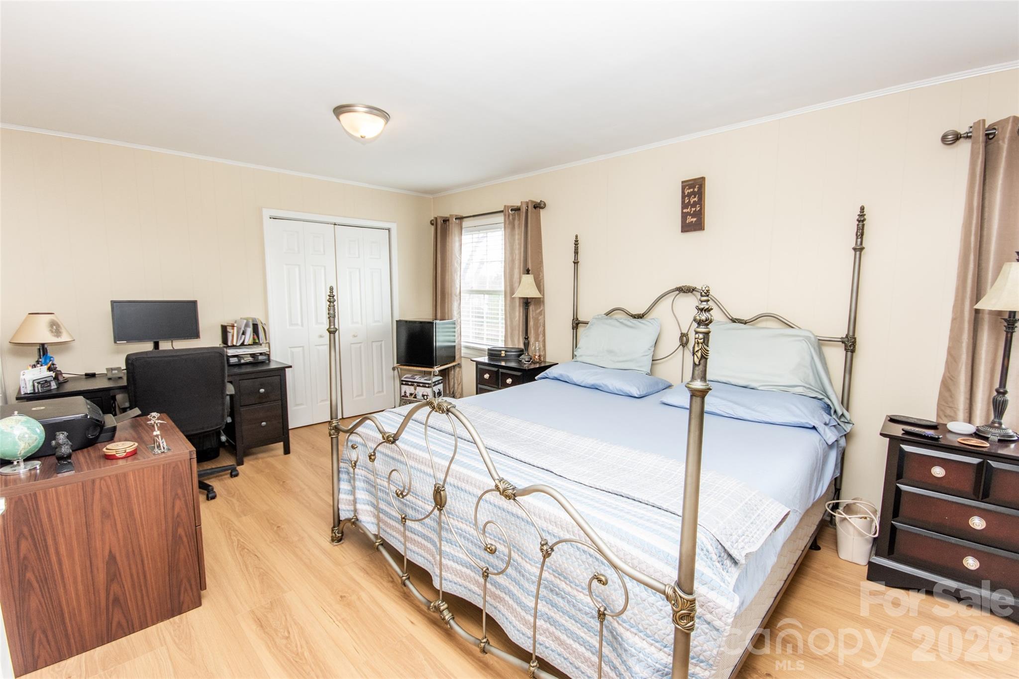 455 Mitch Road Union Grove, NC 28689 - Photo 30 of 44 a bedroom with a bed and wooden floor