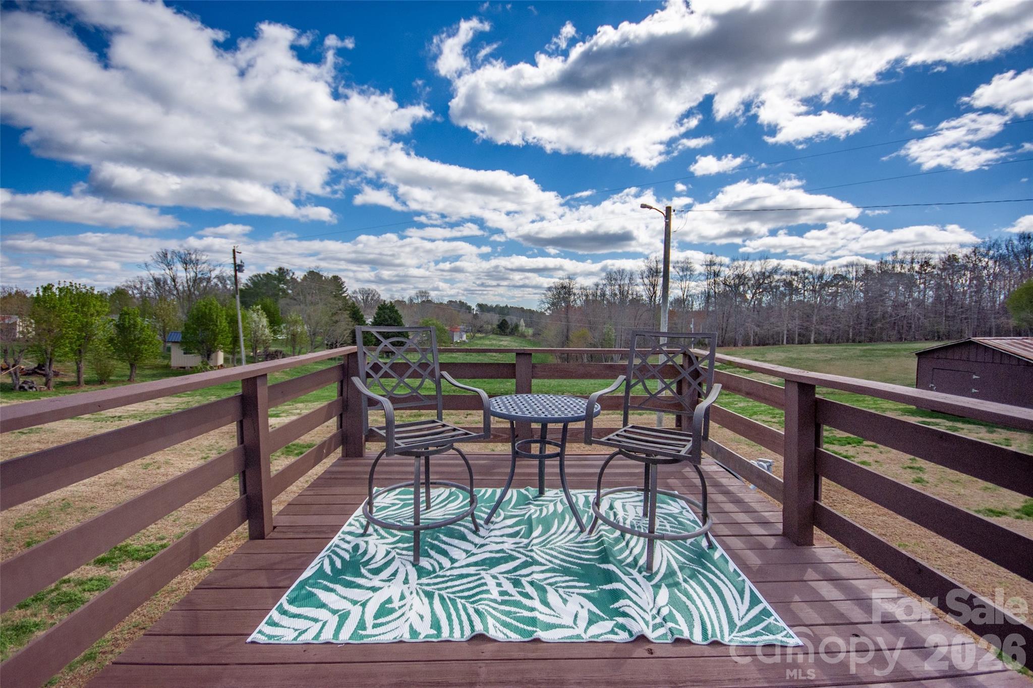 455 Mitch Road Union Grove, NC 28689 - Photo 37 of 44 a view of a chairs and table in patio