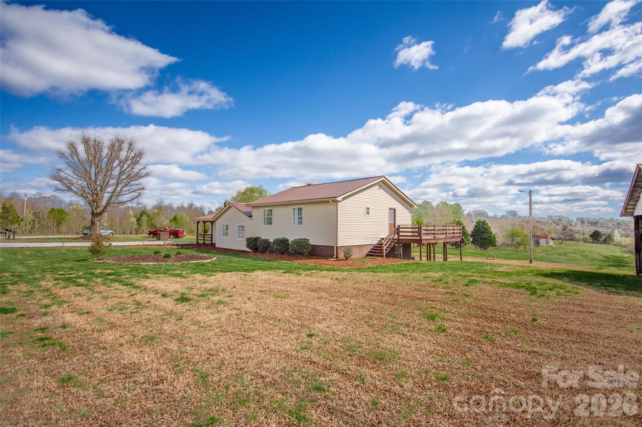 455 Mitch Road Union Grove, NC 28689 - Photo 41 of 44 a view of a house with a yard