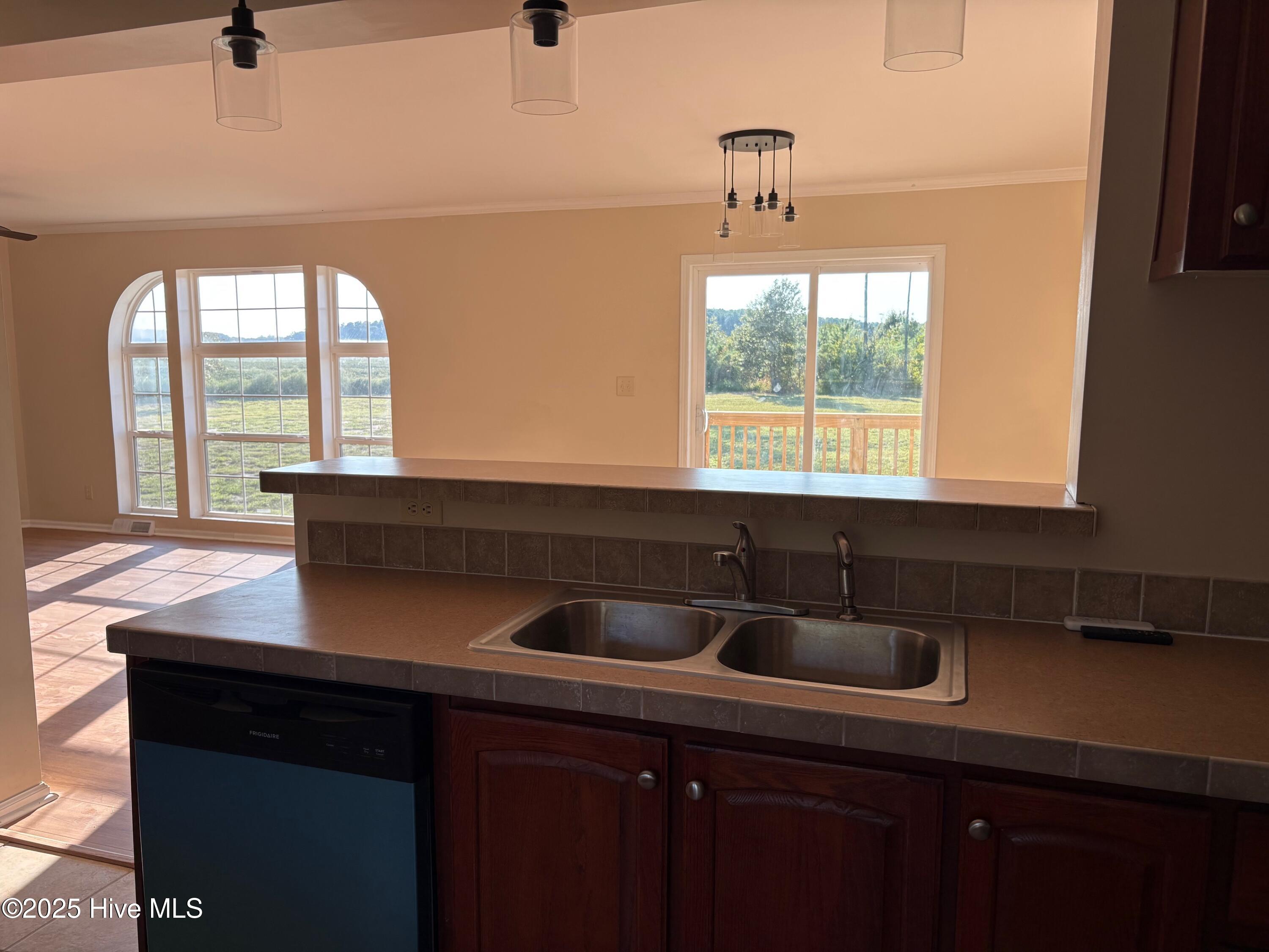 419 Shadneck Road Elizabeth City, NC 27909 - Photo 10 of 37 419 view from kitchen to LR-DR combo