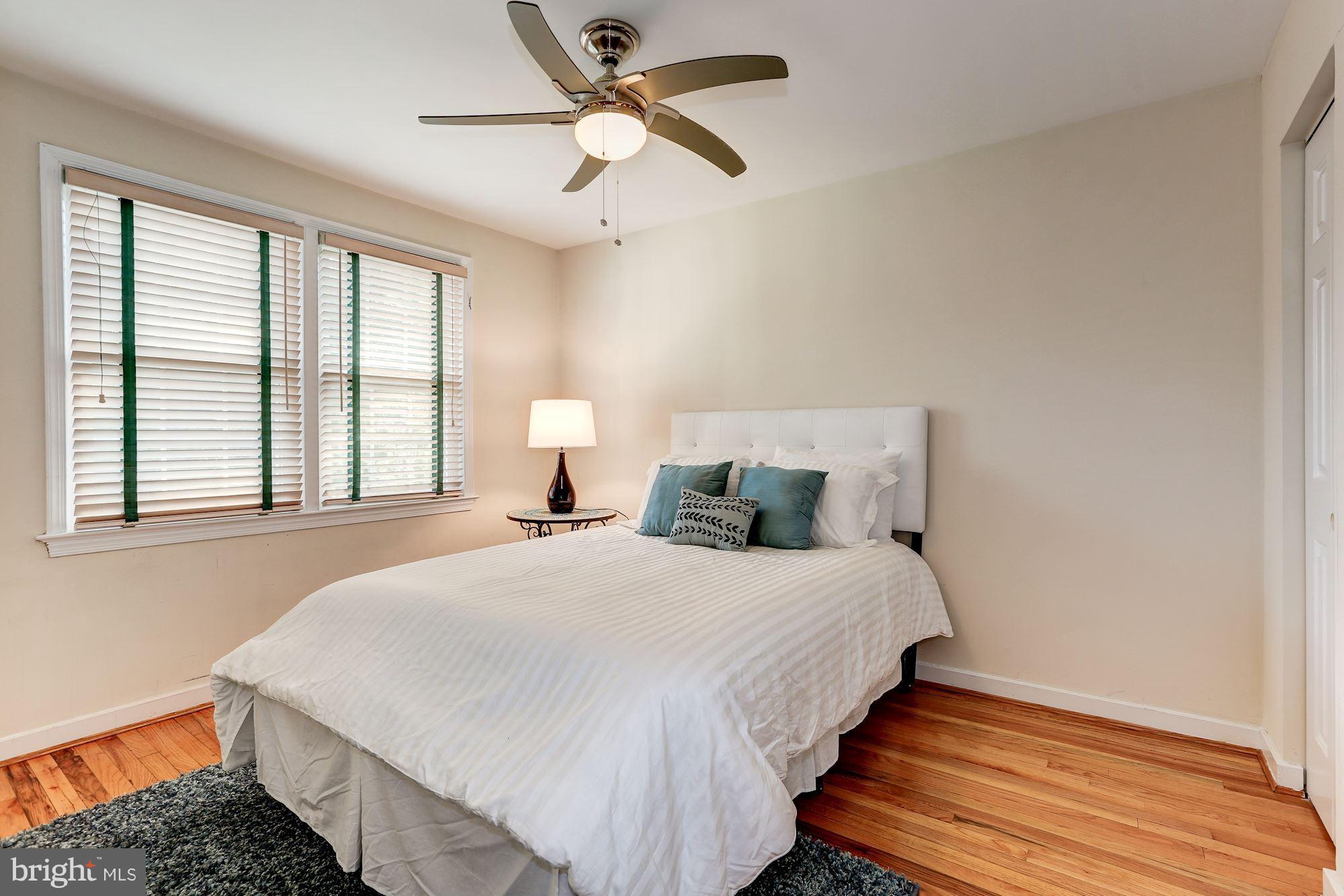 2248 Washington Avenue, Unit 203 Silver Spring, MD 20910 - Photo 20 of 29 a bedroom with bed and window