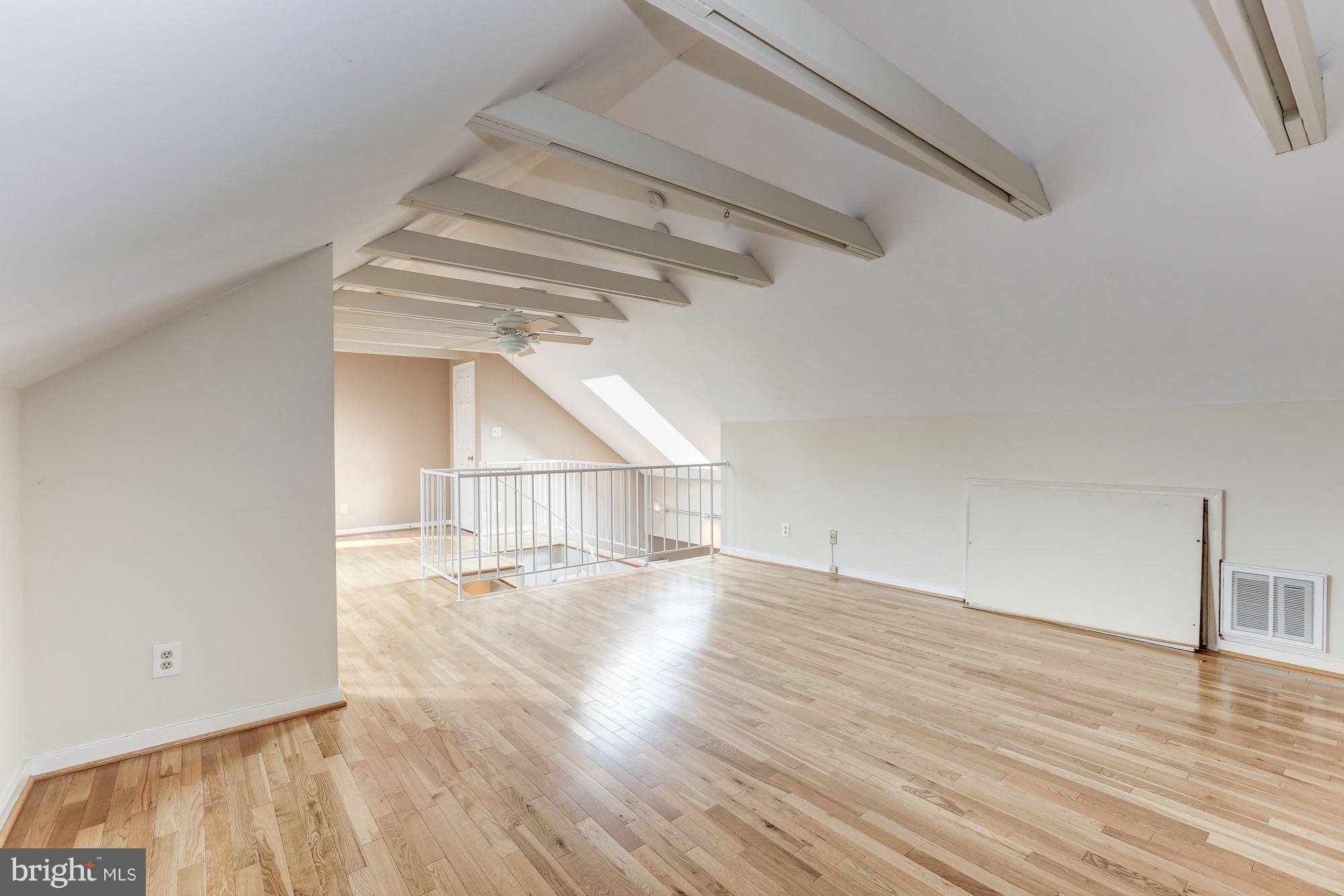 2248 Washington Avenue, Unit 203 Silver Spring, MD 20910 - Photo 27 of 29 wooden floor in an empty room