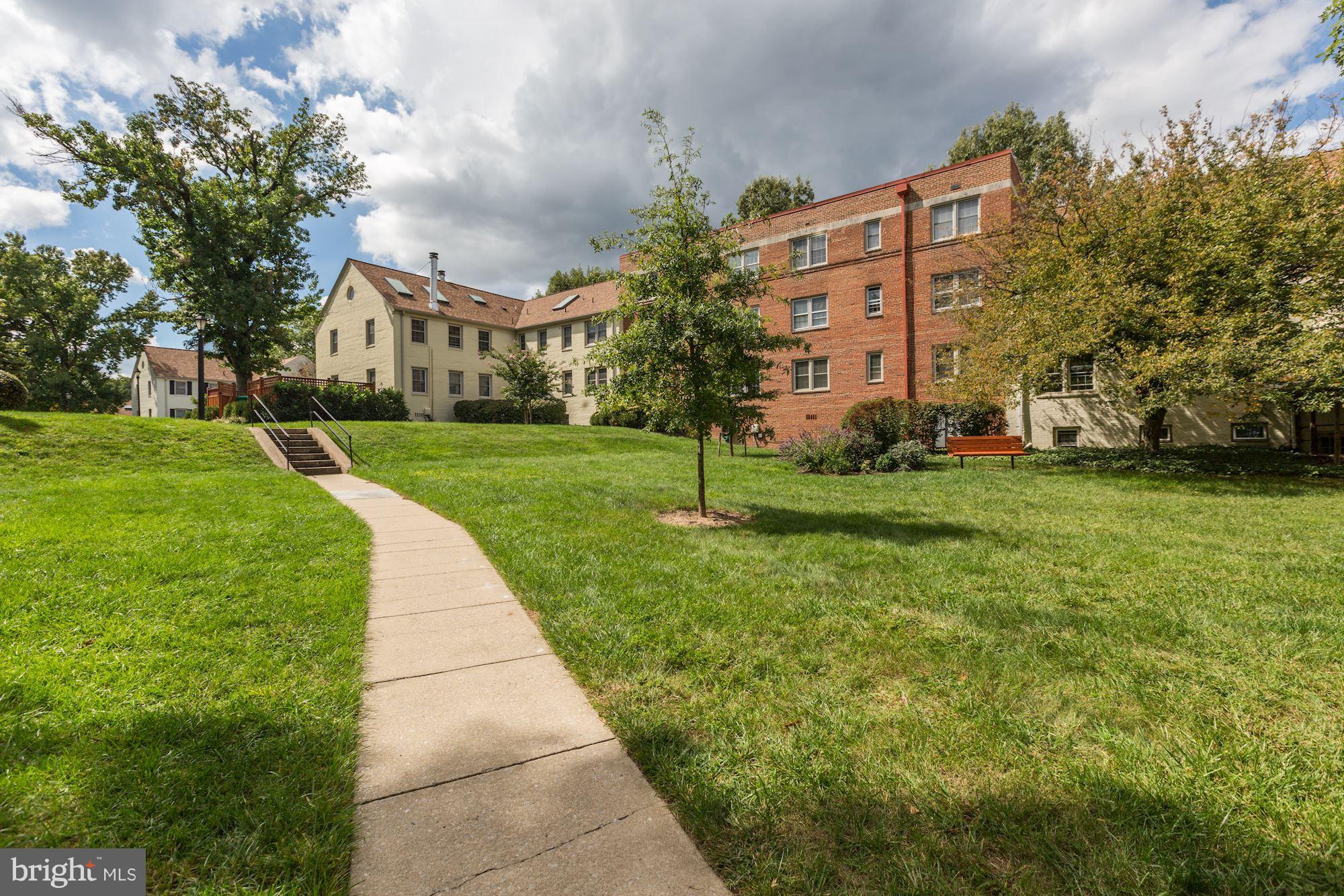 2248 Washington Avenue, Unit 203 Silver Spring, MD 20910 - Photo 29 of 29 a view of a building with a yard
