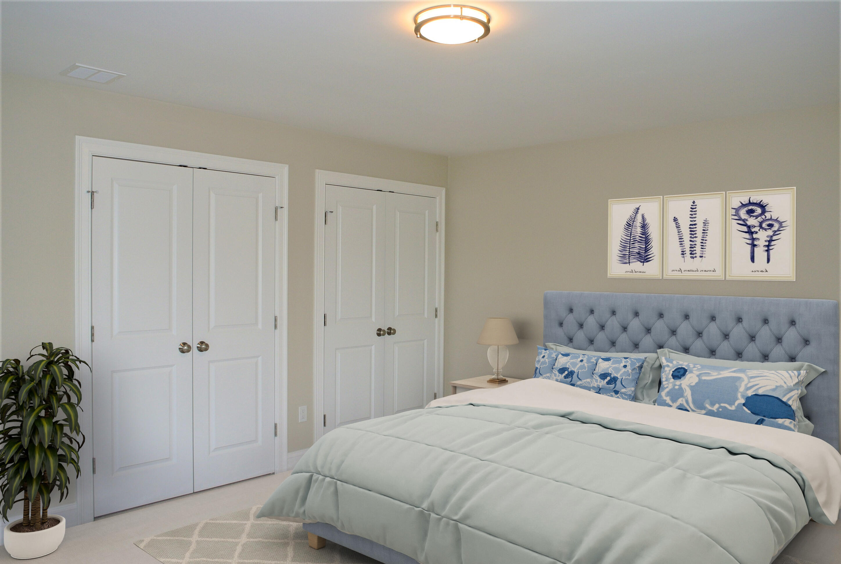 18 Cobblestone Circle Mashpee, MA 02649 - Photo 26 of 41 a bedroom with a bed and a potted plant