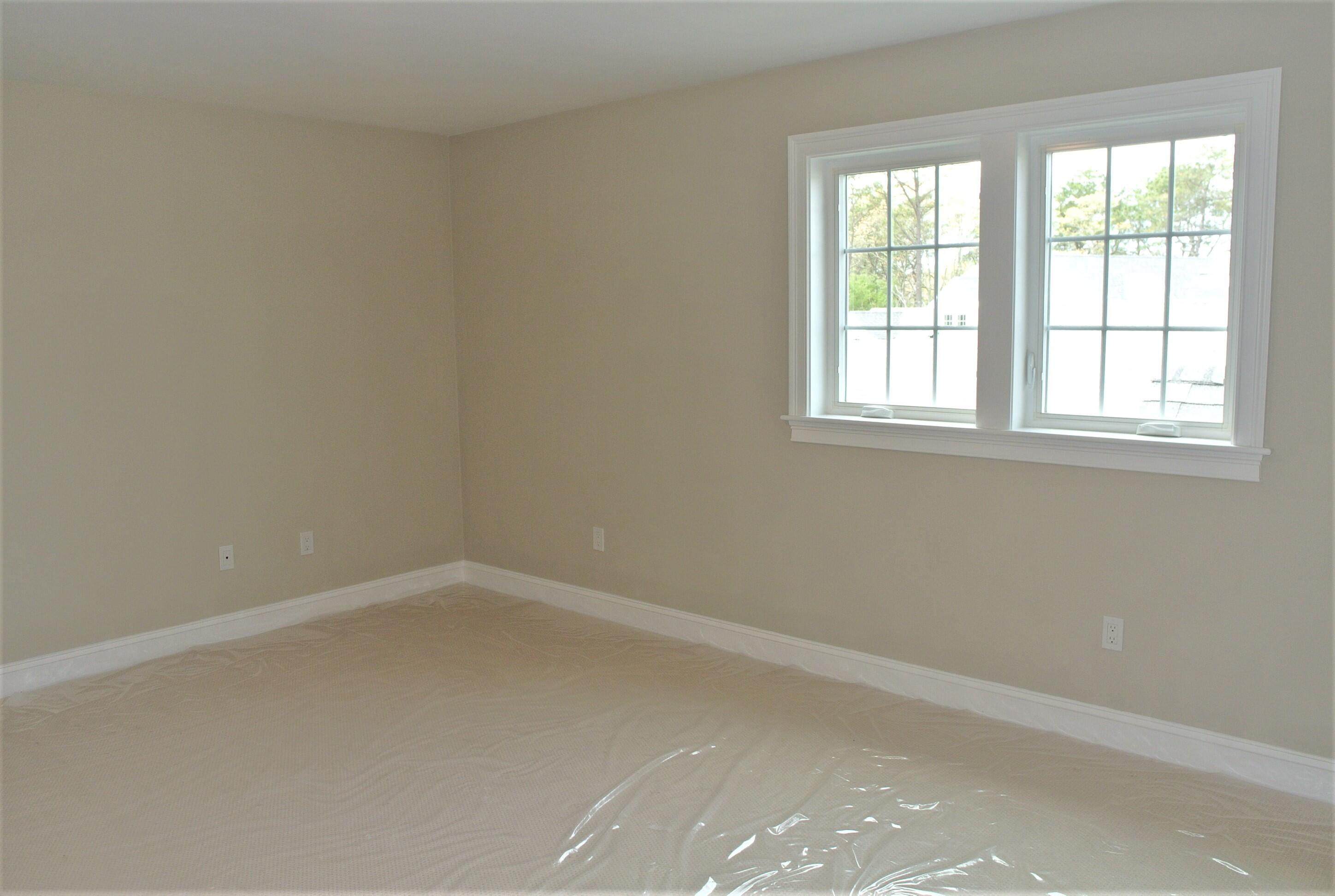 18 Cobblestone Circle Mashpee, MA 02649 - Photo 27 of 41 an empty room with a window