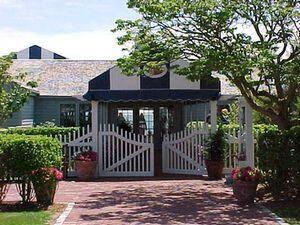 18 Cobblestone Circle Mashpee, MA 02649 - Photo 39 of 41 a front view of a house with a garden