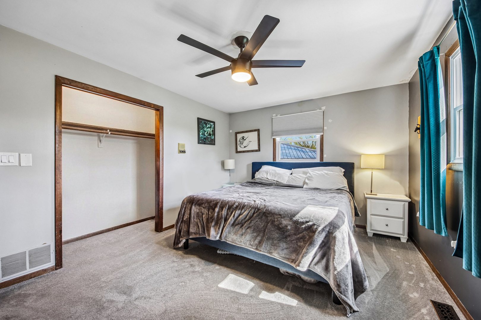 355 Council Trail Lake In The Hills, IL 60156 - Photo 12 of 35 a bedroom with a bed and a ceiling fan
