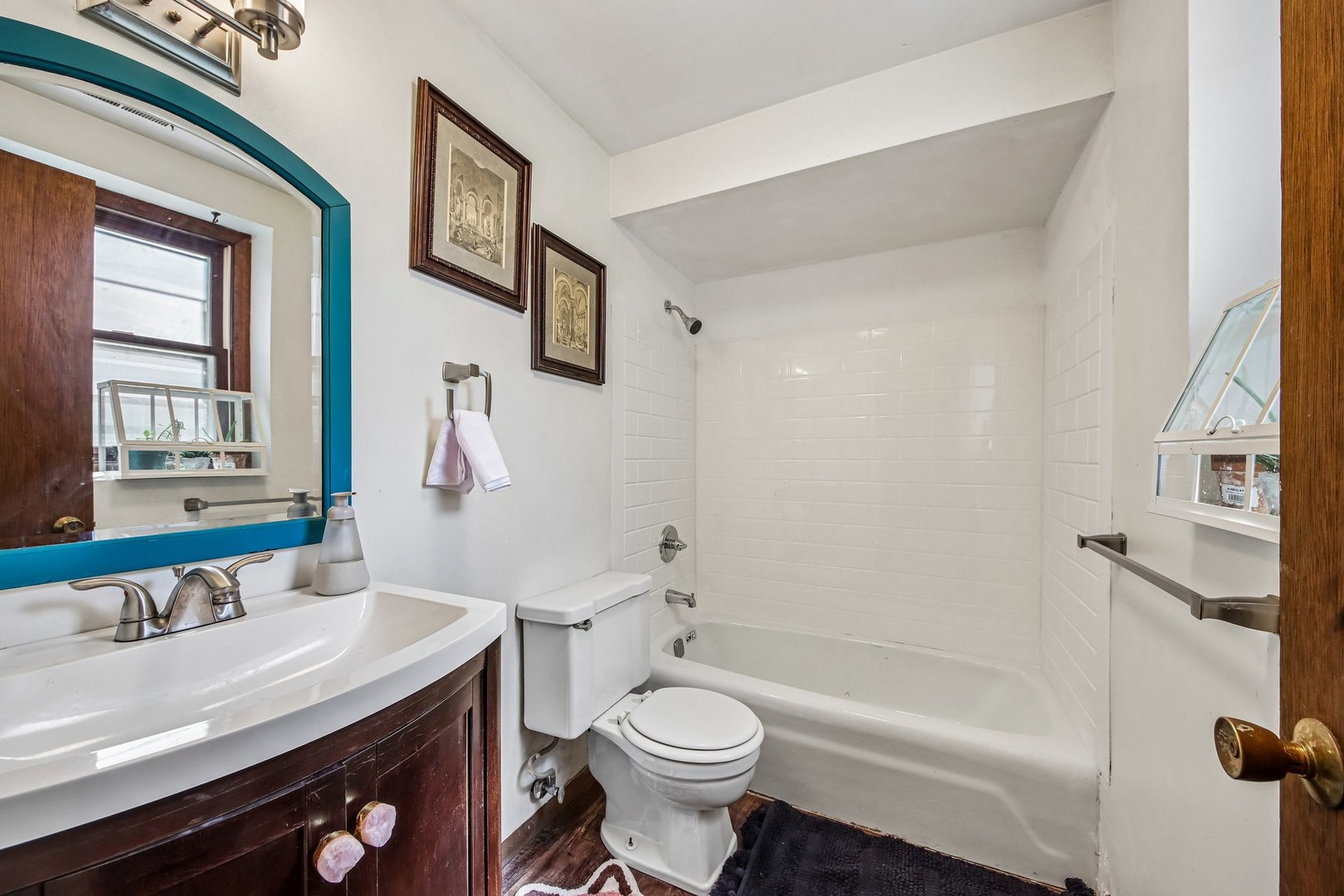 355 Council Trail Lake In The Hills, IL 60156 - Photo 24 of 35 a bathroom with a sink a toilet and a bathtub