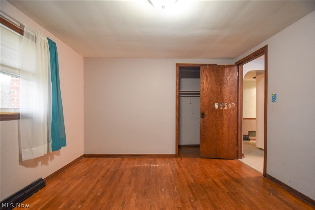9506 Kirk Road North Jackson, OH 44451 - Photo 23 of 50 Unfurnished bedroom featuring a closet and wood-type flooring