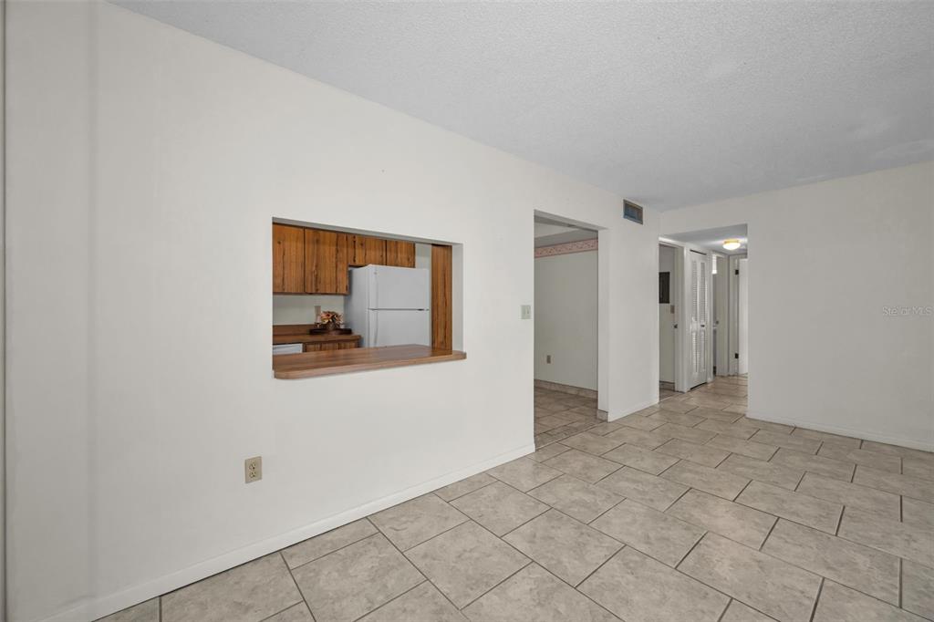 2687 Pine Ridge Way South, Unit B2 Palm Harbor, FL 34684 - Photo 19 of 68 a view of an empty room