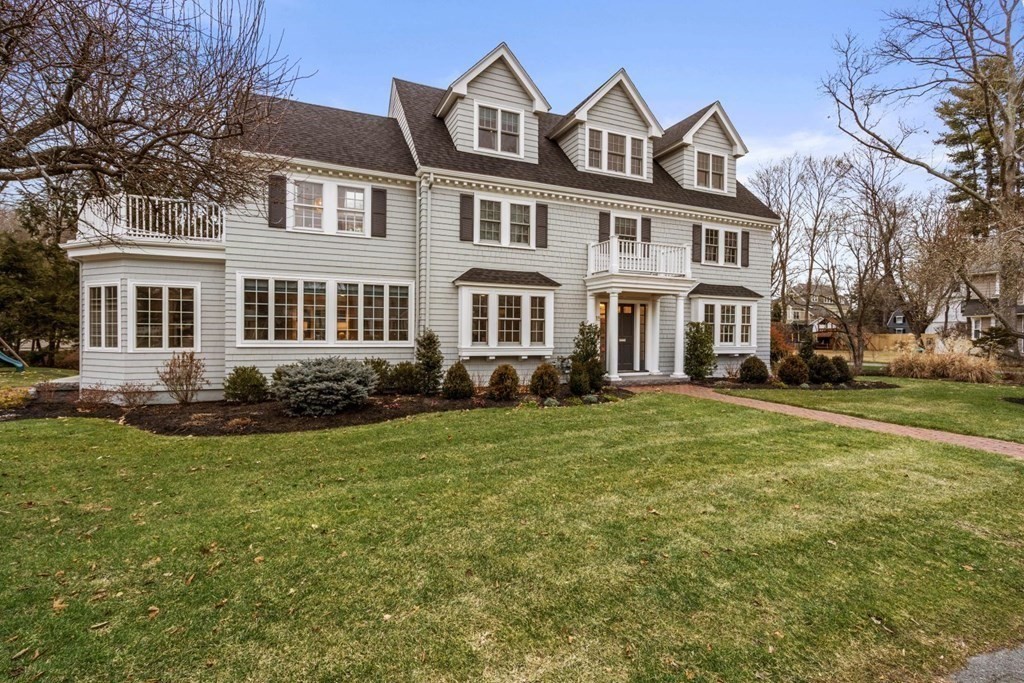 15 Homestead Road Wellesley, MA 02482 - Photo 1 of 35 a front view of a house with a garden