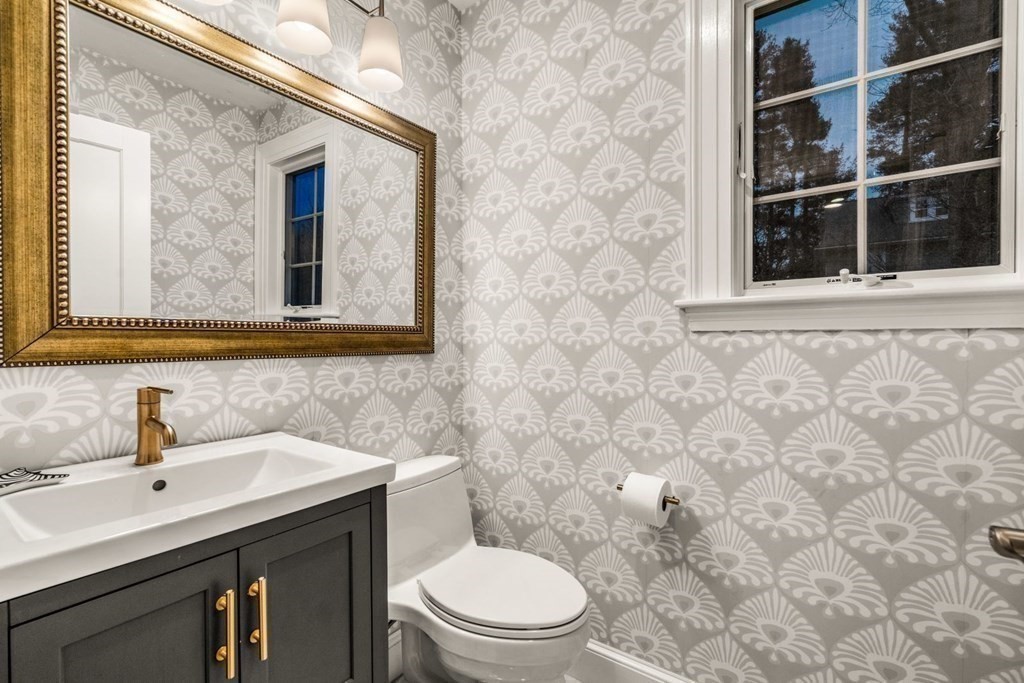 15 Homestead Road Wellesley, MA 02482 - Photo 20 of 35 a bathroom with a toilet a sink and mirror