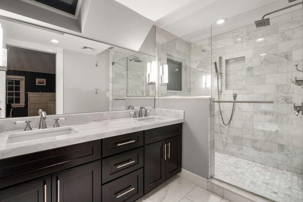 15 Homestead Road Wellesley, MA 02482 - Photo 23 of 35 a bathroom with a granite countertop sink mirror and double