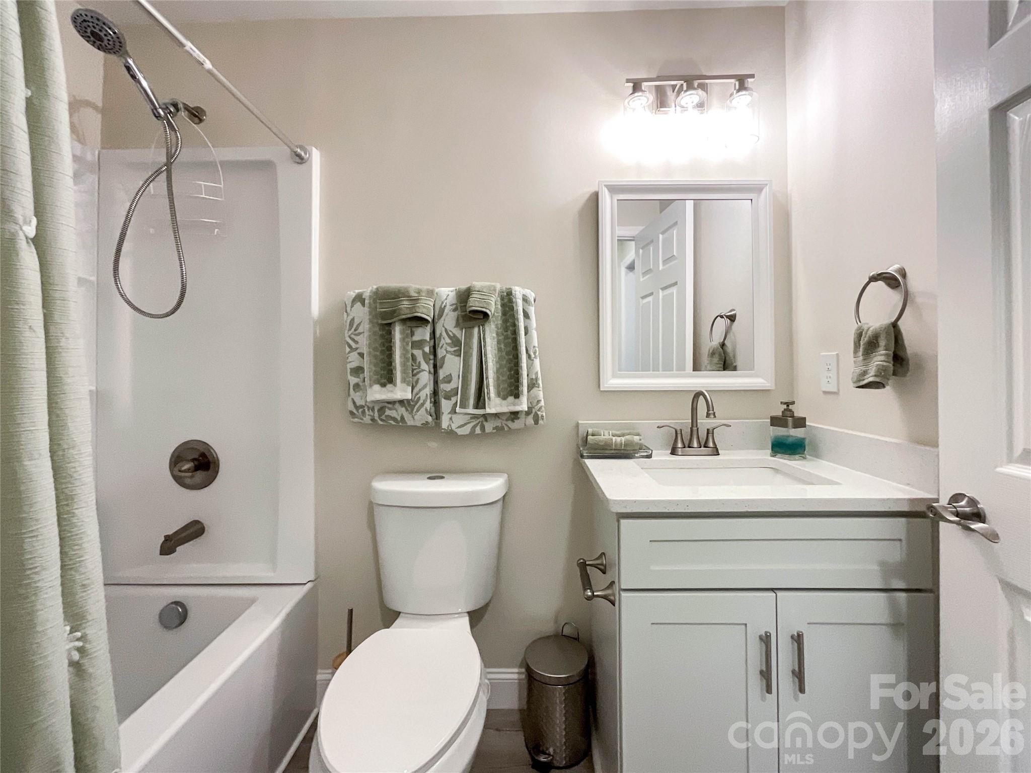404 White Store Road Wadesboro, NC 28170 - Photo 6 of 38 a bathroom with a toilet sink and shower
