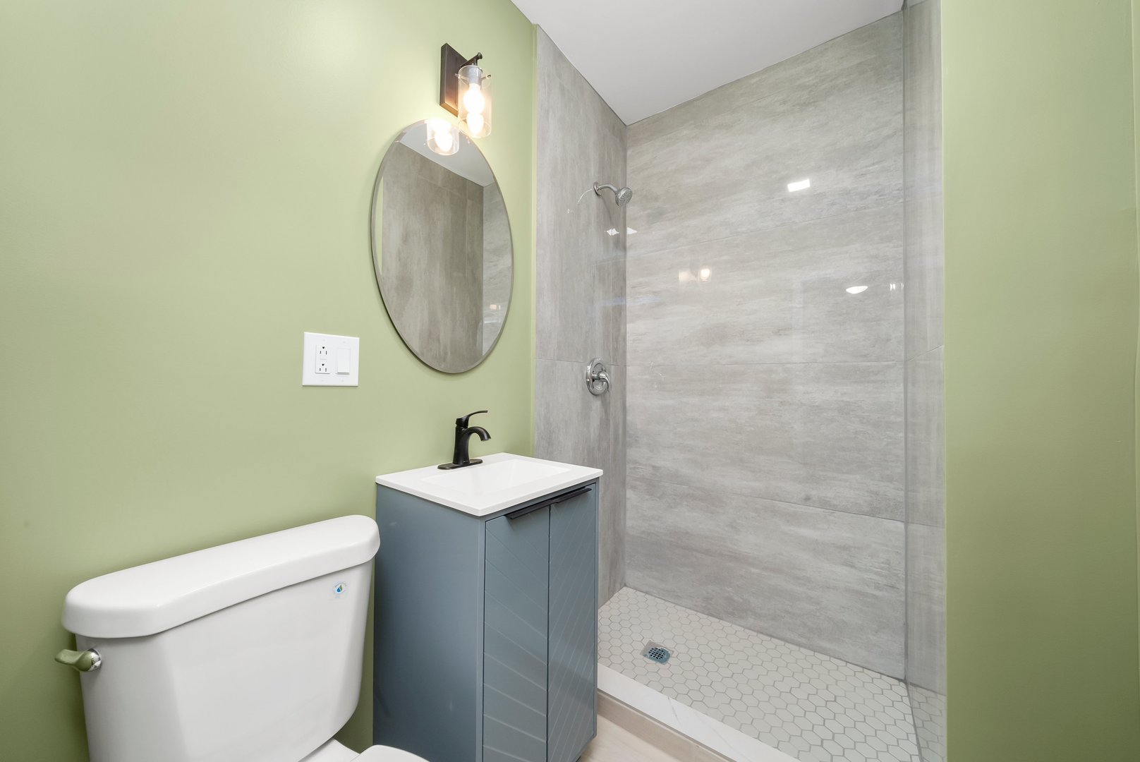 8331 South Morgan Street Chicago, IL 60620 - Photo 11 of 40 a bathroom with a sink toilet and shower