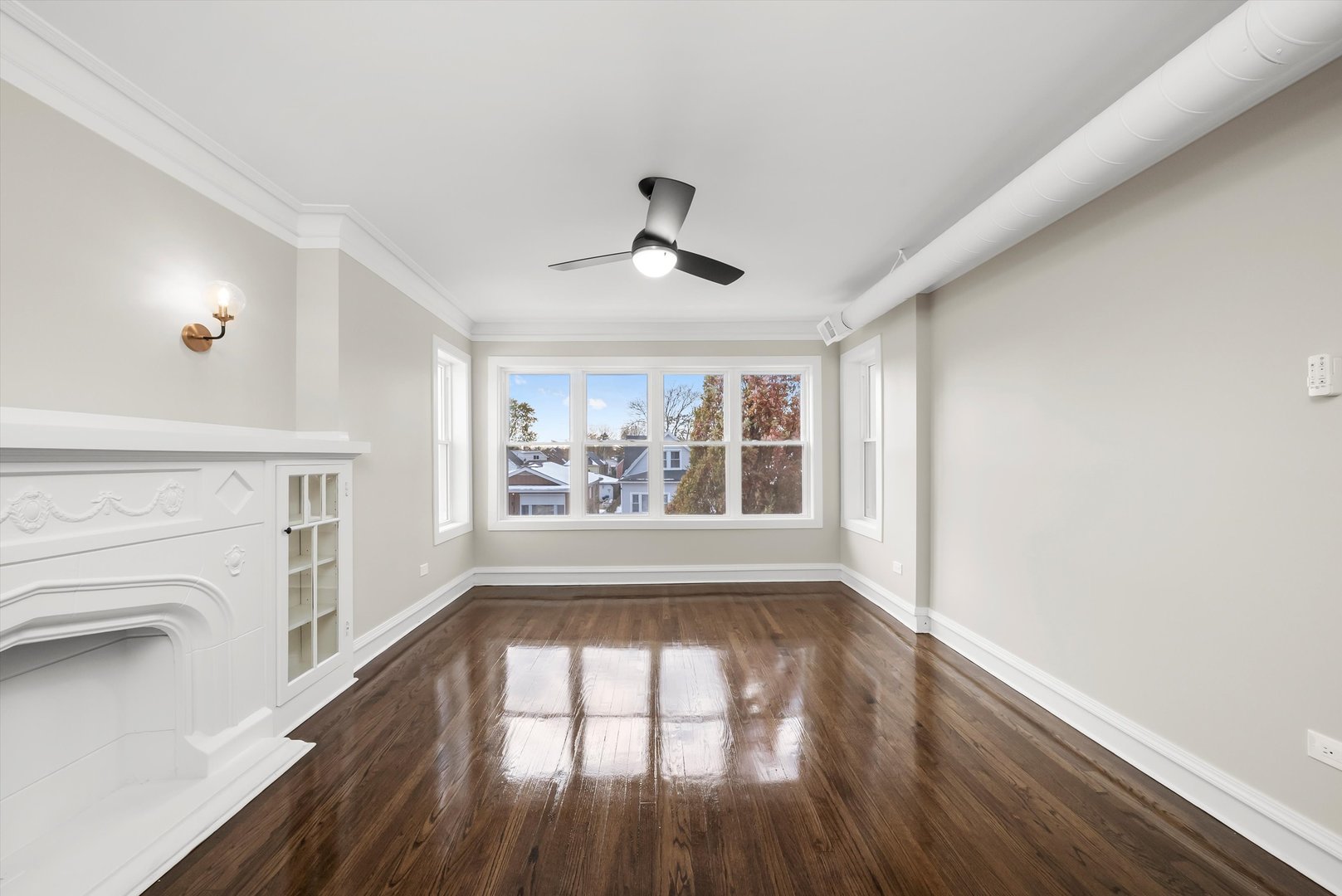 8331 South Morgan Street Chicago, IL 60620 - Photo 2 of 40 wooden floor in an empty room with a window