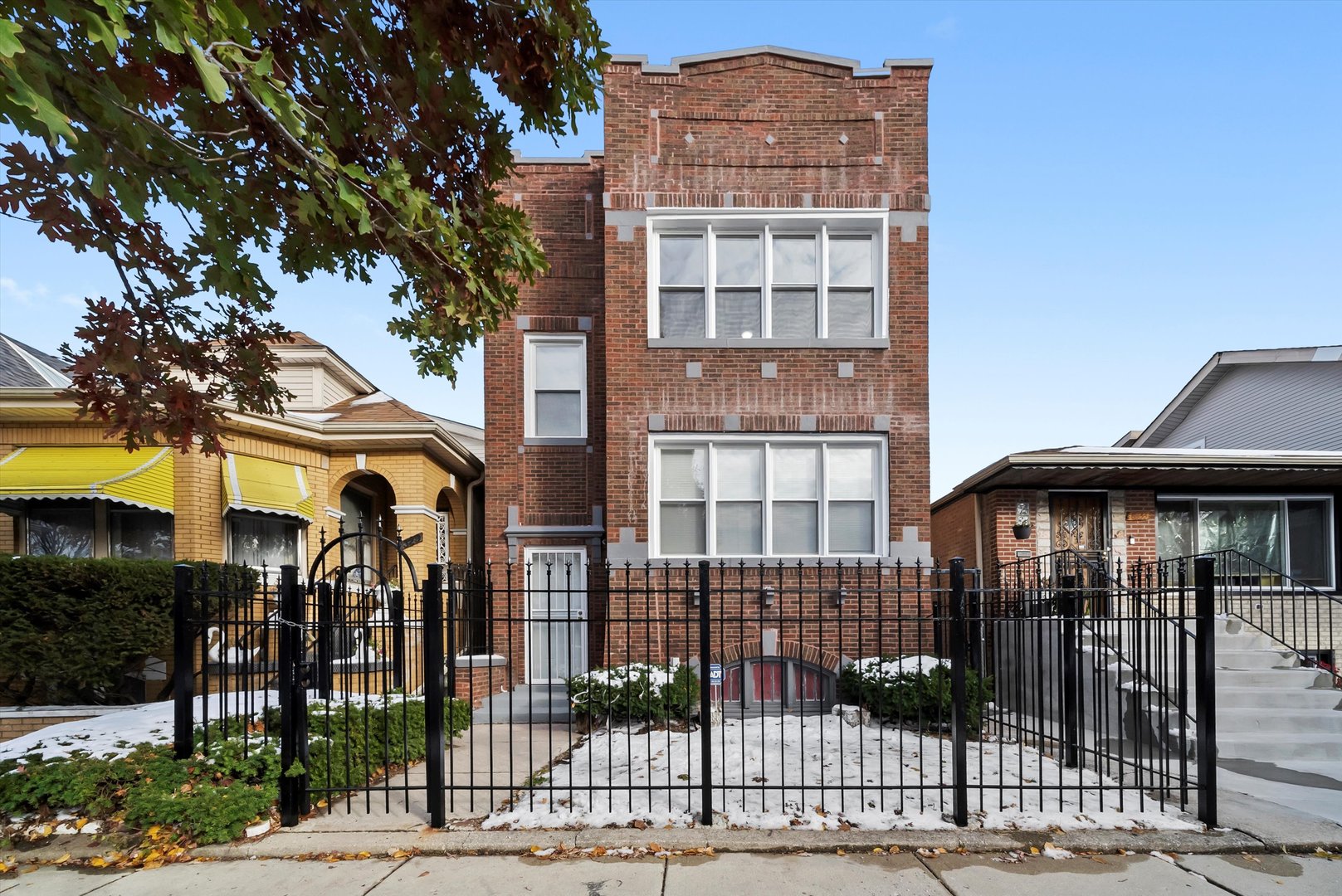 8331 South Morgan Street Chicago, IL 60620 - Photo 40 of 40 a front view of a multi story building