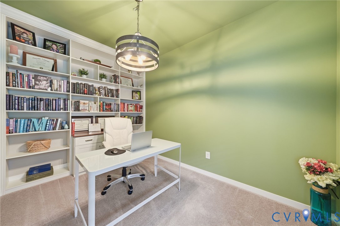 7598 Rural Point Road Mechanicsville, VA 23116 - Photo 17 of 41 a view of workspace with book shelf