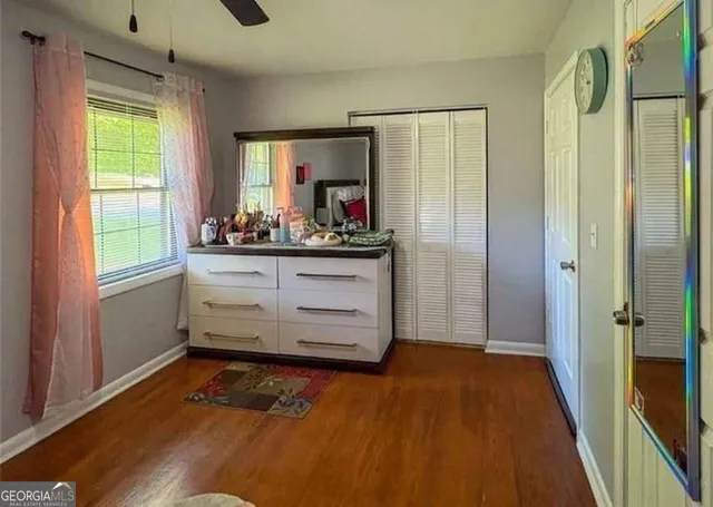 a view of room with window and bathroom