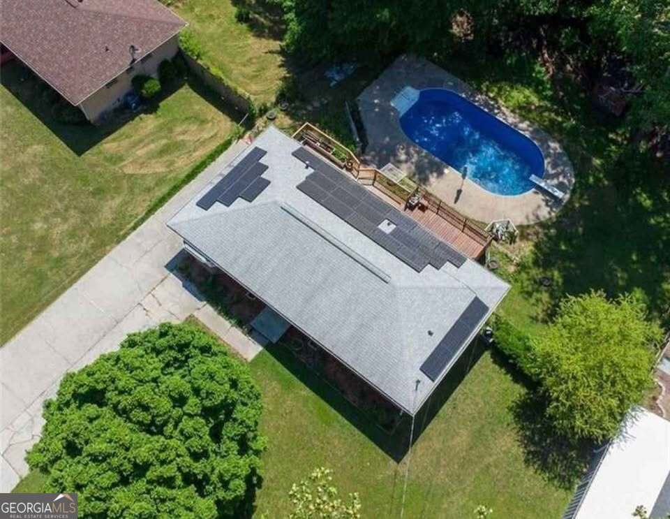 724 Camelot Way Norcross, GA 30071 - Photo 9 of 11 an aerial view of a house with a yard