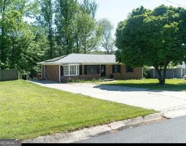 a view of a house with a swimming pool