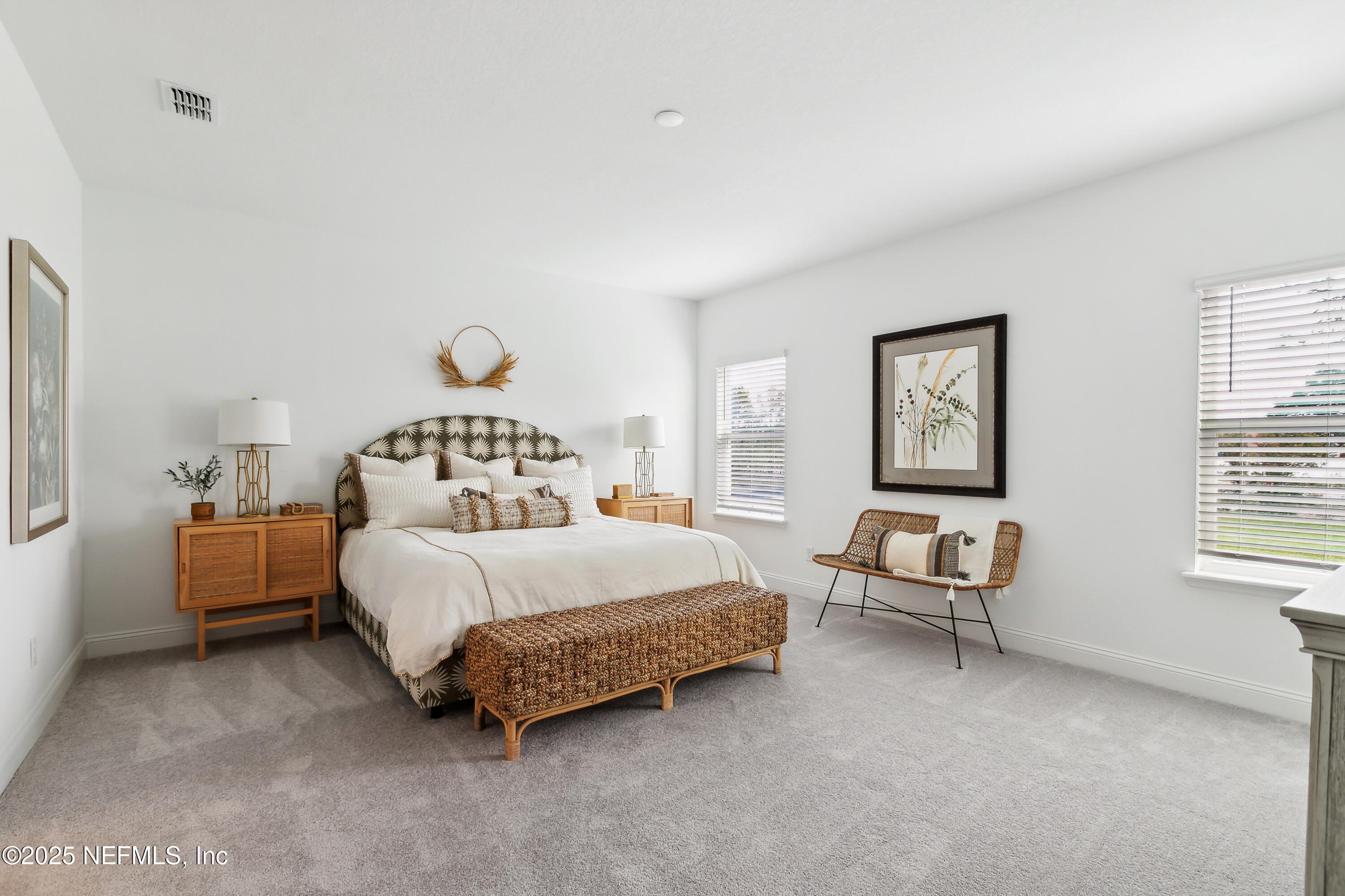 3363 Tupelo Loop Green Cove Springs, FL 32043 - Photo 11 of 26 a bedroom with a bed and a window