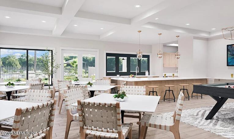 3363 Tupelo Loop Green Cove Springs, FL 32043 - Photo 23 of 26 a living room with lots of furniture and a large window