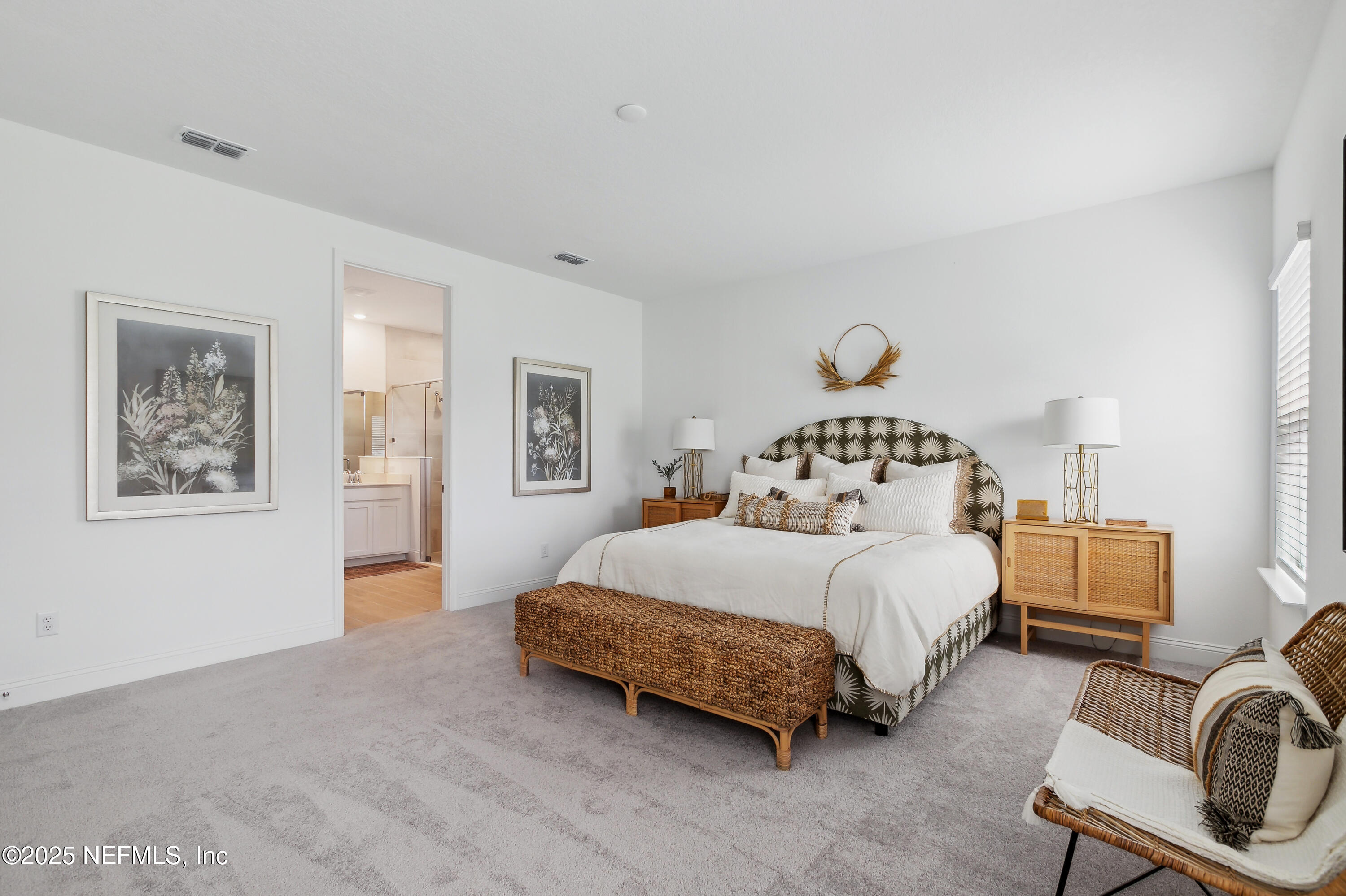 3363 Tupelo Loop Green Cove Springs, FL 32043 - Photo 10 of 26 a spacious bedroom with a bed and a window