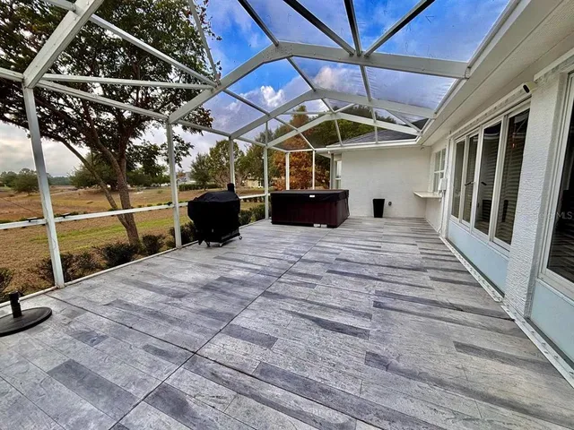 a view of a car park in front of a house