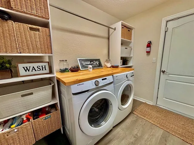 a utility room with dryer and washer