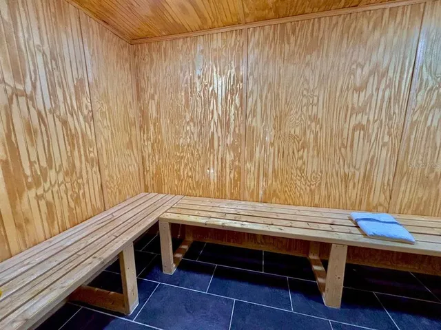 a view of wooden furniture with walls