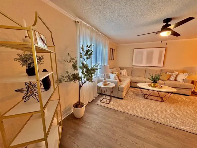 a living room with patio furniture