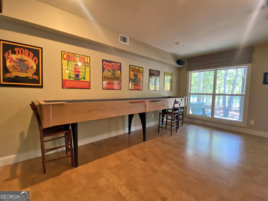 1045 Paynes Creek Road Hartwell, GA 30643 - Photo 22 of 37 a view of a livingroom with furniture window and wooden floor
