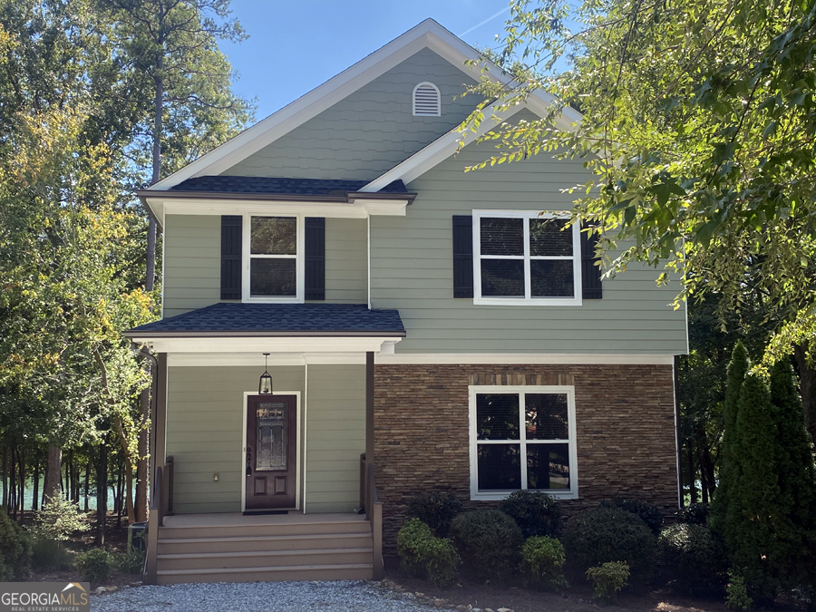 1045 Paynes Creek Road Hartwell, GA 30643 - Photo 37 of 37 a front view of a house with a garage