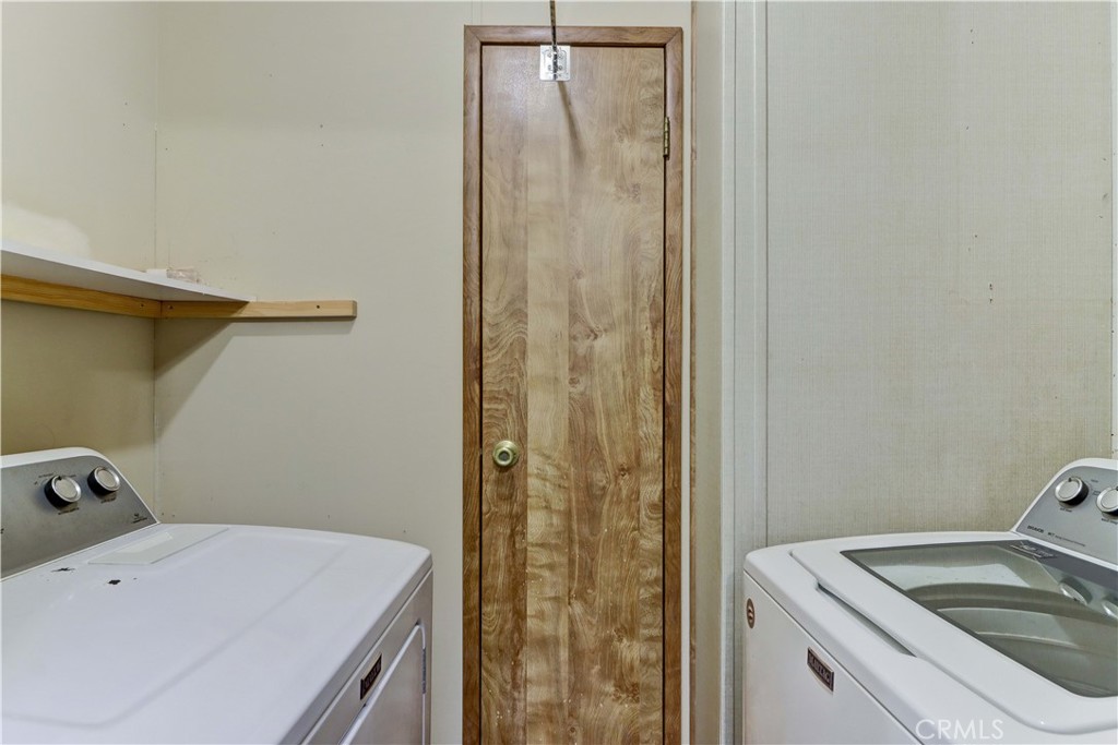 2509 View Lake Santa Ana, CA 92705 - Photo 16 of 74 a bathroom with a sink and washing machine