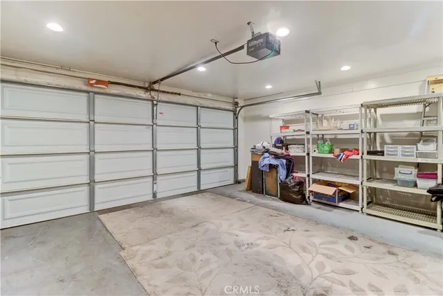 a outdoor space with patio couches and a barbeque